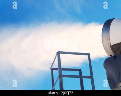 Snow cannon machine blowing artificial snow on Azuga ski domain, Prahova  Valley region, Romania, during the Winter low season, due to the lack of  natu Stock Photo - Alamy