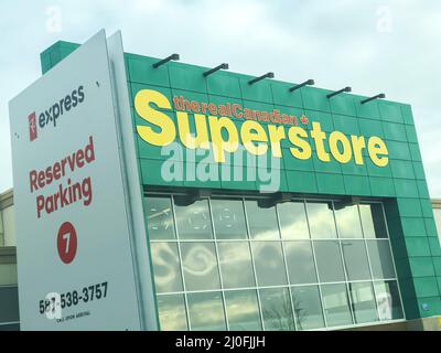 Calgary Alberta, Canada. Oct 17, 2020. The real canadian superstore building with the PC express reserved Parking for picking up Stock Photo