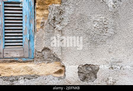 Blue window on a white wall Stock Photo