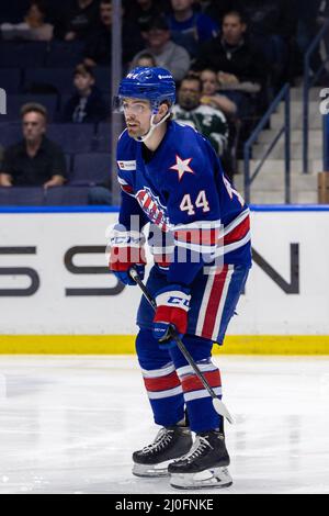 March 18, 2022: Rochester Americans forward Ben Holmstrom (18) wears a  local high school jersey while taking warmups prior to a game against the Cleveland  Monsters.The Rochester Americans hosted the Cleveland Monsters