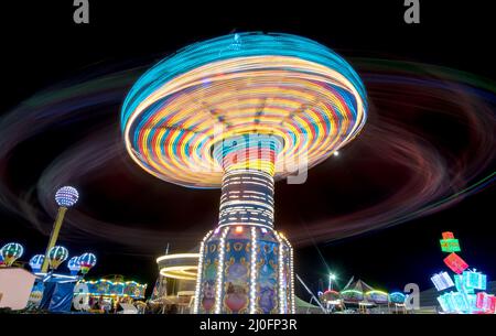Colorful Carousel spinning fast Stock Photo