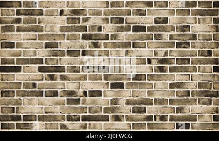 Background image: a fragment of an old stone wall. Stock Photo