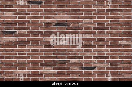 Background image: a fragment of an old stone wall. Stock Photo