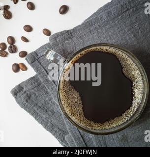 Black coffee in a Cup on the table Stock Photo