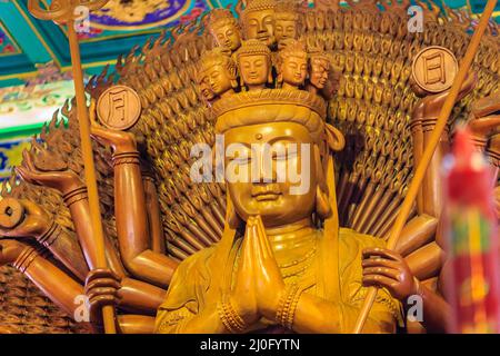 Beautiful images of Guanyim, or Guan Yin, Chinese god in Chinese temple. Thousand hands of  Guan Yin, Chinese god image make of Stock Photo