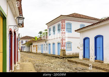 Streets with cobblestone pavement with old houses in colonial style in the city of Paraty Stock Photo