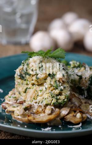 Stuffed dumplings with mushroom sauce Stock Photo