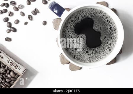 Black coffee in a Cup on the table Stock Photo