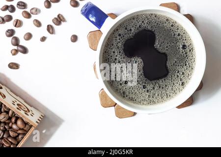 Black coffee in a Cup on the table Stock Photo
