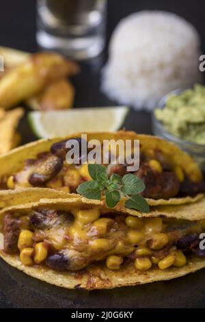 Mexican tacos with rice on slate Stock Photo