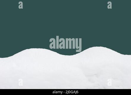 Snow drift isolated on Tidewater Green color background Stock Photo