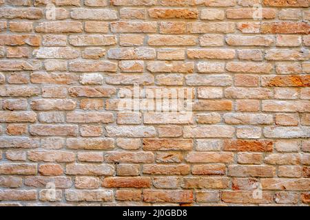 Background from an old and worn red brick wall Stock Photo