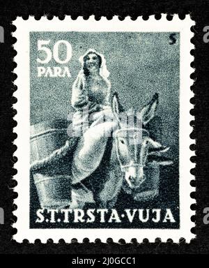 Commemorative postage stamp from the former Yugoslavia, overprinted STT VUJNA, with illustration of the donkey of the free territory of Trieste, zone Stock Photo