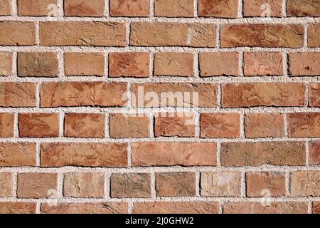 Background from a clean orange brick wall Stock Photo