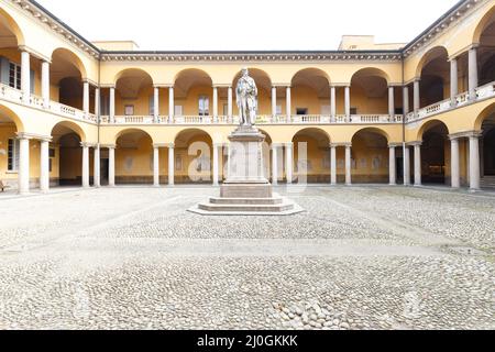 Pavia, Italy - March 12, 2022: street view inside the cloister of Pavia University, no people are visible. Stock Photo