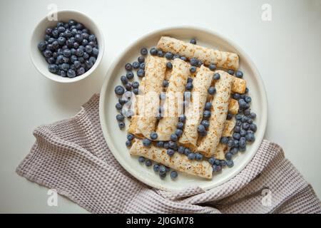 homemade classic pancakesHealthy summer breakfast with fresh berryes, morning light-copy space view Stock Photo