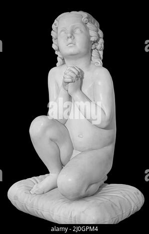 Angel wings isolated on black background with copyspace. Statue of cherub wing close-up Stock Photo