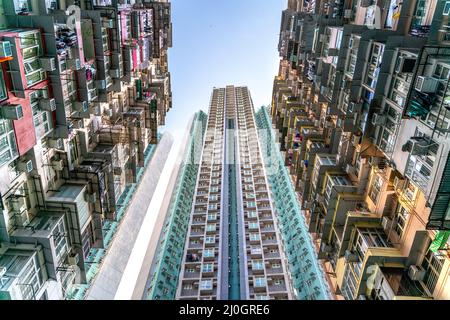 The popular between tourists place called Montane Mansion near to Tai Koo in Hong Kong. Overcrowded old retro building Stock Photo