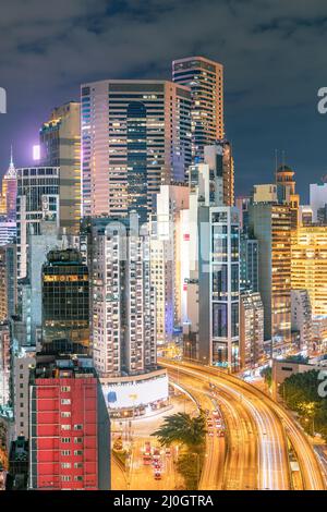 The amazing night and sunset view of cityscape and skyscrapers in Hong-Kong Stock Photo