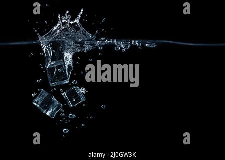 Falling ice cubes Stock Photo