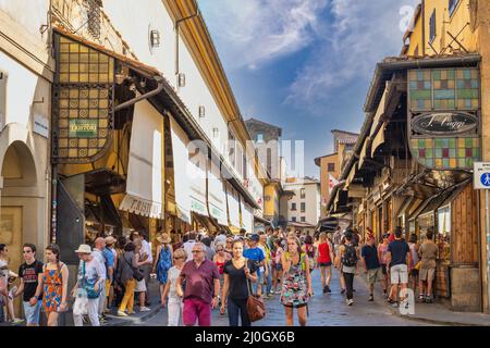 Florence, Italy - July 1, 2015 : many tourist and jewelry shop on Ponte Vecchio Bridge, Tuscany Italy Stock Photo