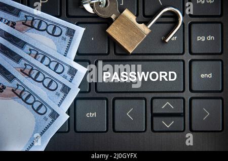 Password text on laptop tab with locker and bank notes background. Online security concept Stock Photo