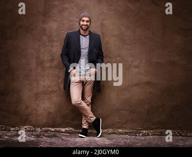 Looking hot when its cold. Portrait of a handsome young man in winter attire. Stock Photo
