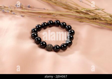 Stone bead bracelets handmade from lucky stones. Copy Space Stock Photo