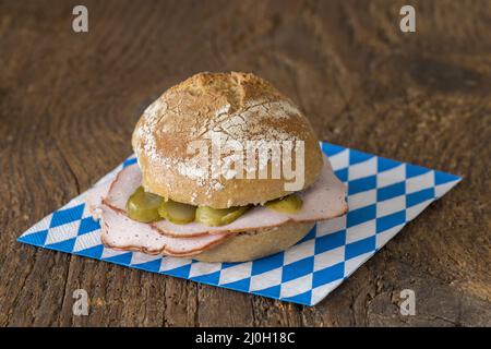 Liver cheese sandwich on wood Stock Photo