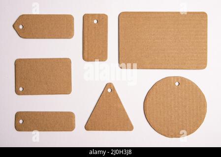 Realistic cardboard price tags of different shapes isolated on white background Stock Photo
