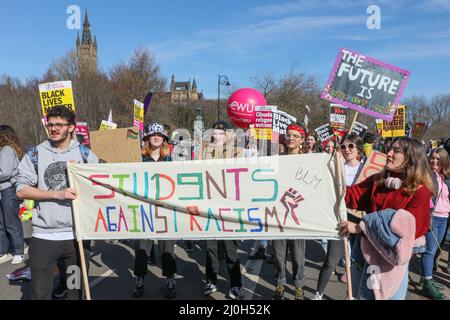 Glasgow, UK. 19th Mar, 2022. More than 1000 people marched through ...