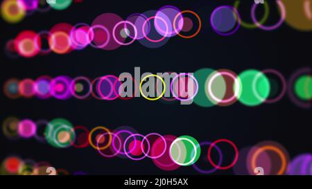 Rows of multi colored circles and rings Stock Photo