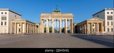 Panorama of the famous Brandenburg Gate in Berlin early in the morning with no people Stock Photo