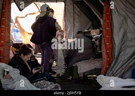 Przemysl, Poland. 19th Mar, 2022. Civilians, fleeing from Ukraine due to ongoing Russian attacks, continue to enter through the Medyka border crossing in Przemysl, Poland on March 15, 2022. Medyka borders, safe and sound. Photo by Emilie Madi/ABACAPRESS.COM Credit: Abaca Press/Alamy Live News Stock Photo