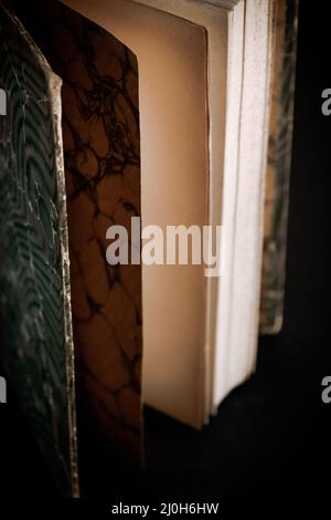 Old book on black background Stock Photo