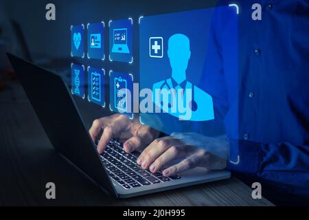 Online heath care and medical doctor consultation for remote diagnosis, digital prescription and therapy with internet and computer. Patient using lap Stock Photo