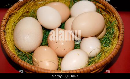 Natural eggs in the easter basket Stock Photo