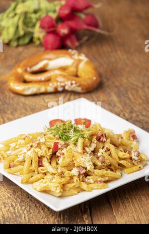 Bavarian pasta with ham and eggs Stock Photo