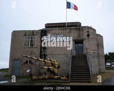 Batz sur Mer, France - March 2, 2022:  Grand Blockhaus is a former Atlantic wall bunker transformed into a museum. A German 88 mm (Flak) anti-aircraft Stock Photo