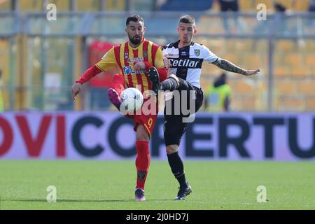 Enrico Delprato of PARMA CALCIO competes for the ball with Massimo Coda of US LECCE during the Serie B match between Parma Calcio and US Lecce at Ennio Tardini on March 19, 2022 in Parma, Italy. Stock Photo