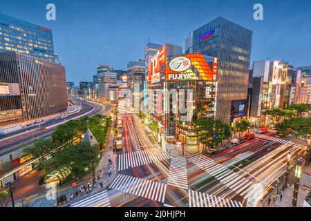 TOKYO, JAPAN - MAY 9, 2017: The Ginza district at night. Ginza is a popular upscale shopping area of Tokyo. Stock Photo