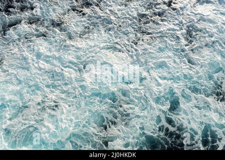 Sea  water surface  with waves from a cruise ship wake. Stock Photo