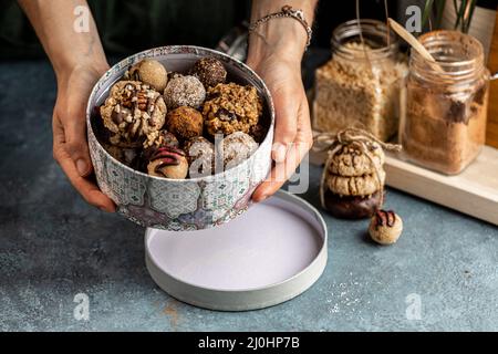 Candy bar concept with zero sugar sweets. Delicious homemade and healthy truffles, biscuits and cookies. Stock Photo