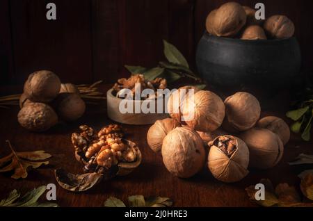Walnuts on a dark background in a rustic style Stock Photo