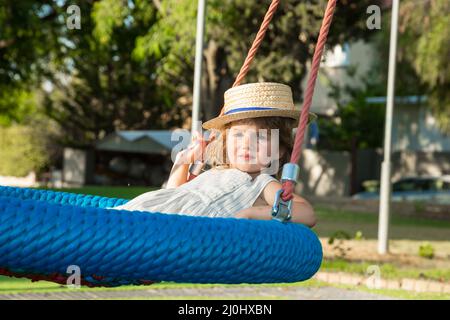 Beautiful little girl in a straw hat Stock Photo