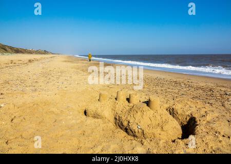 Sand castle on beach, California Norfolk, UK Stock Photo