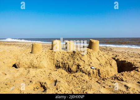 Sand castle on beach, California Norfolk, UK Stock Photo