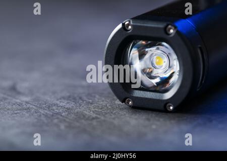 Led black lantern close-up on gray textured background, free space Stock Photo