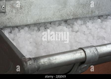 Hailstones in gutter Stock Photo
