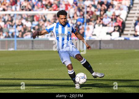 Huddersfield, UK. 19th Mar, 2022. Duane Holmes #19 of Huddersfield Town with the ball in Huddersfield, United Kingdom on 3/19/2022. (Photo by Simon Whitehead/News Images/Sipa USA) Credit: Sipa USA/Alamy Live News Stock Photo